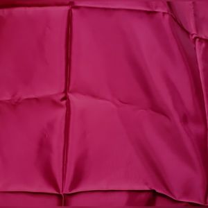 Fabric remnant burgundy/magenta semi-satin polyester. 44 in x 70 in.